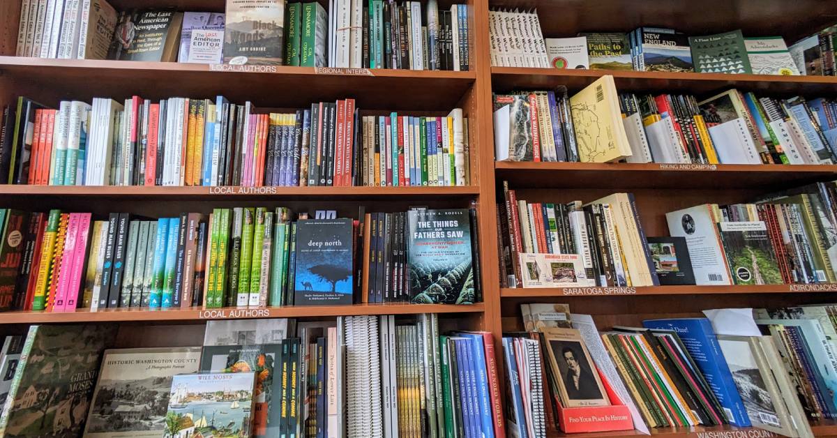 bookshelves with local authors at battenkill books