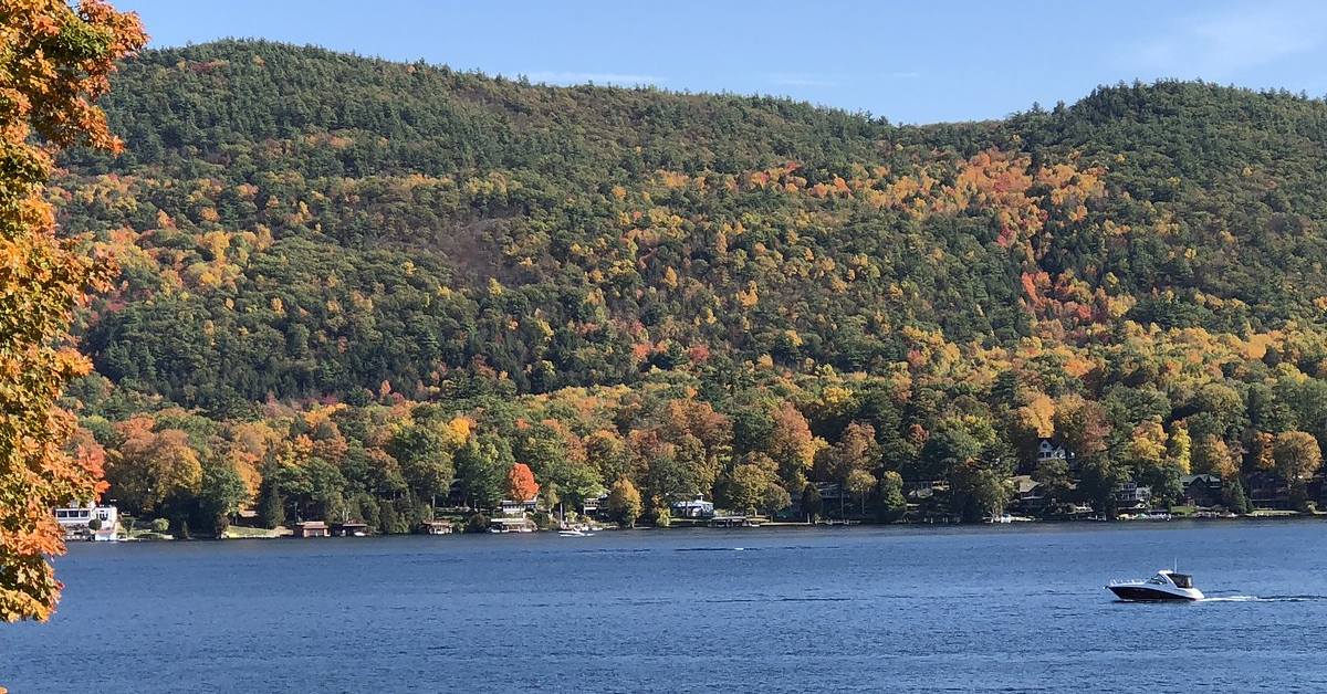 boat on lake george in the fall