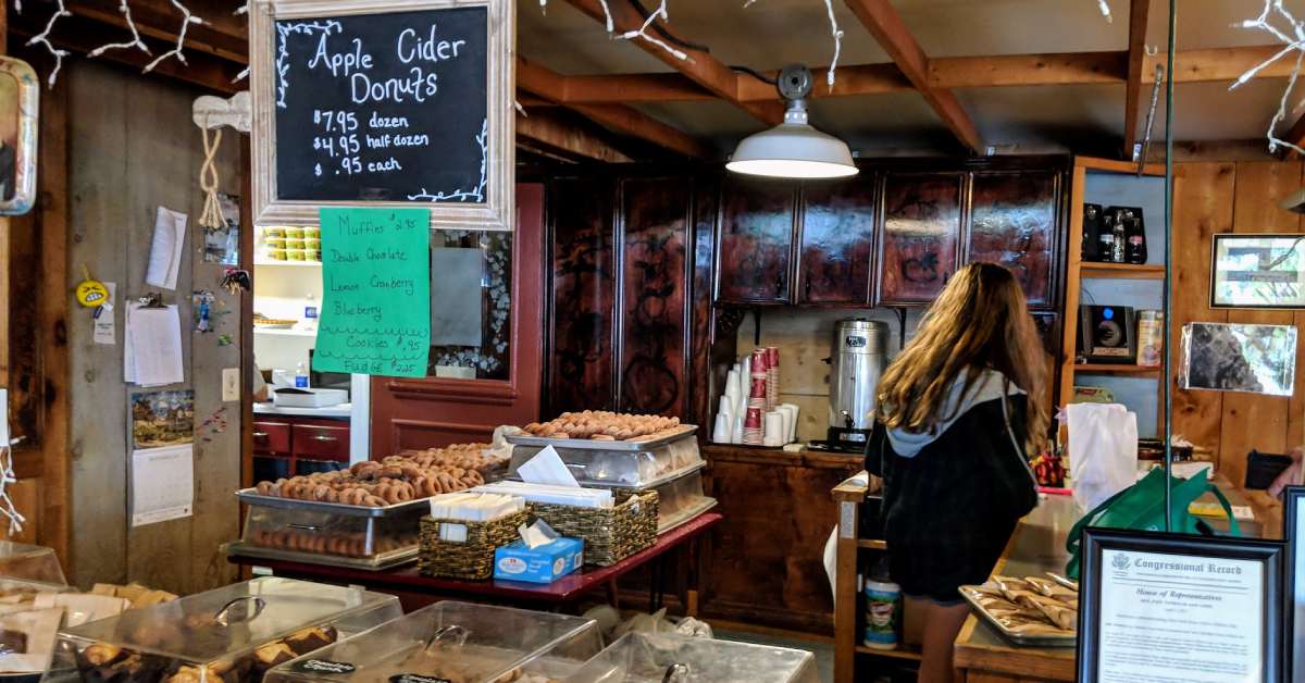 bakery counter with donuts in the back