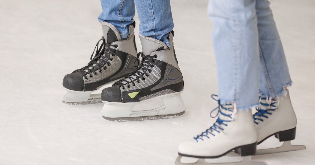 two people wearing ice skates