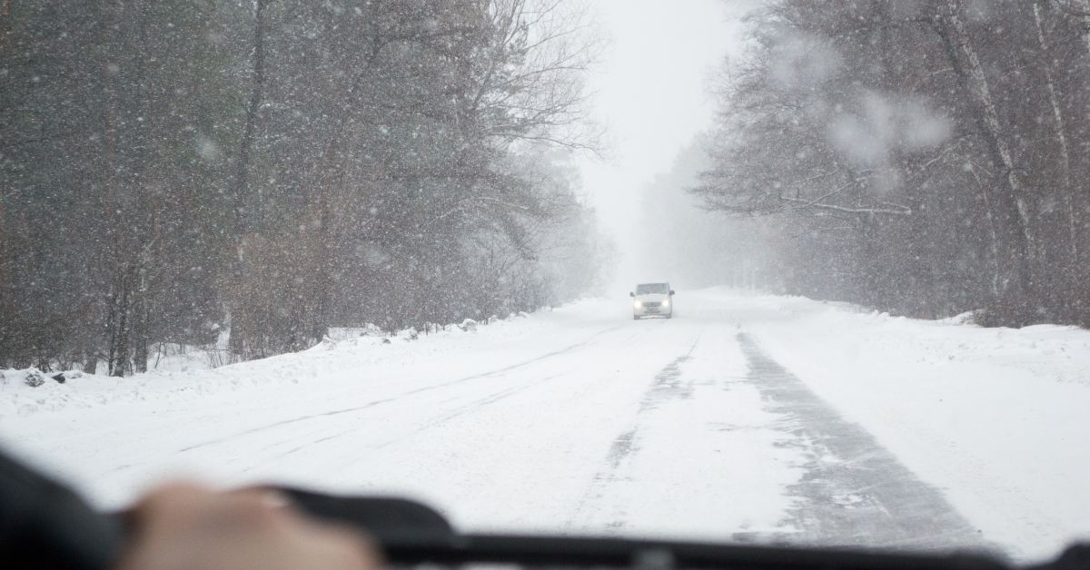 car facing another car on snowy road