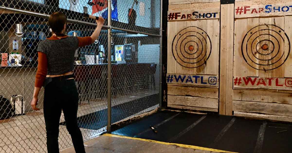 woman axe throwing