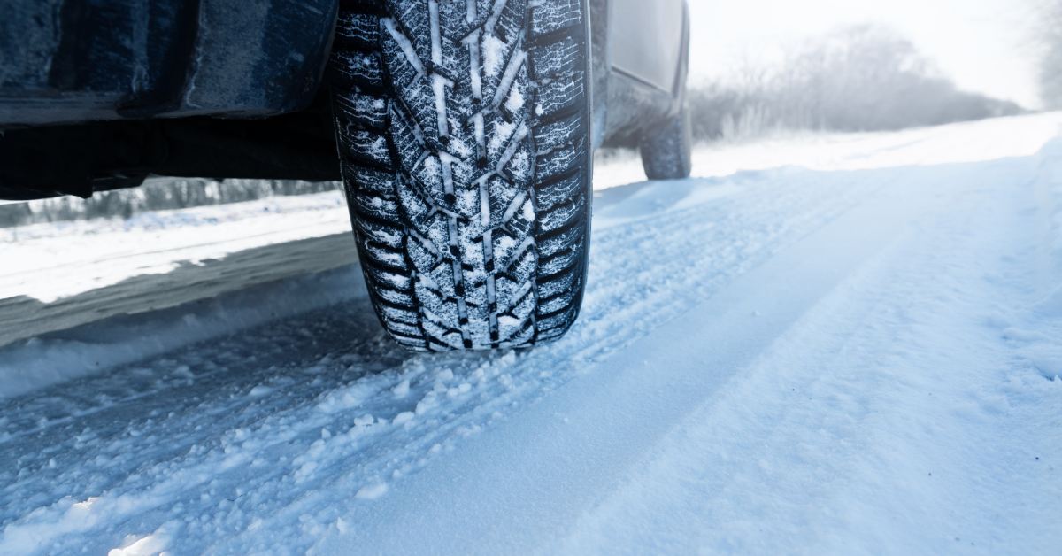 a car tire on snowy road