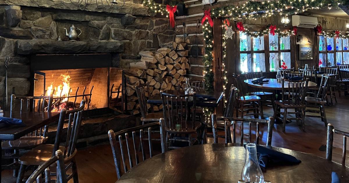 log cabin atmosphere with fire in fireplace at log jam restaurant