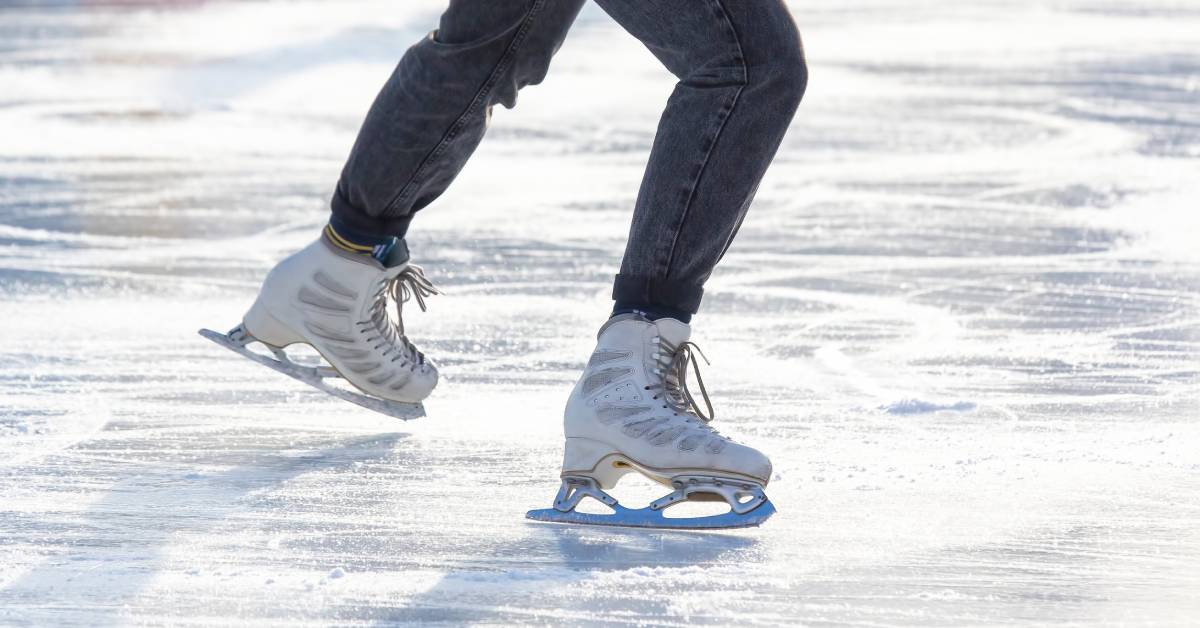 an ice skater with white skates