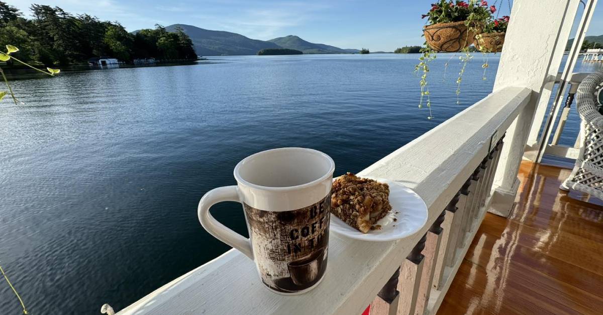 coffee and danish on deck looking out at waterfront