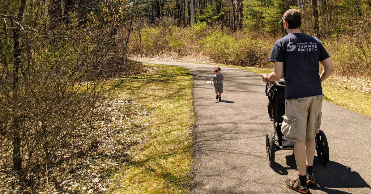dad with stroller and kid on warren county bikeway