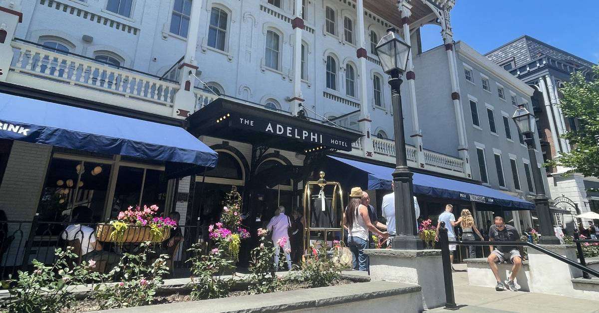 people walking outside the Adelphi Hotel