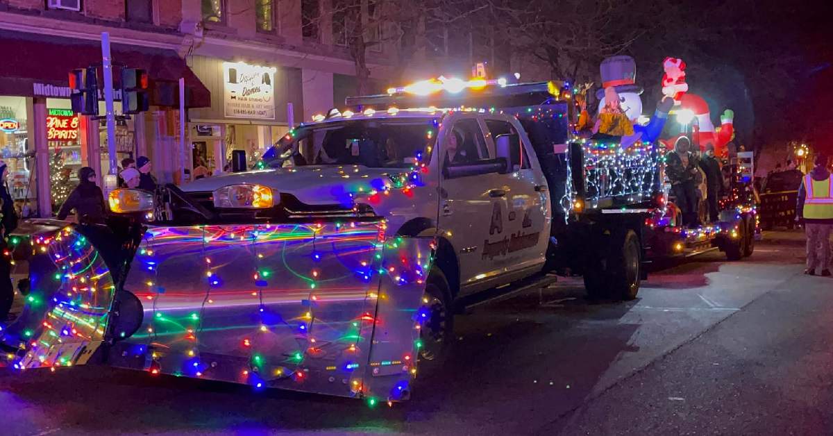 a truck tractor decorated with Christmas lights
