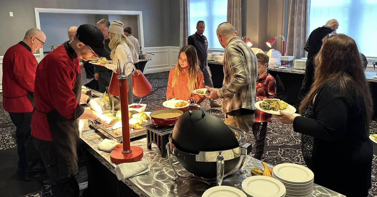 people at holiday buffet at queensbury hotel
