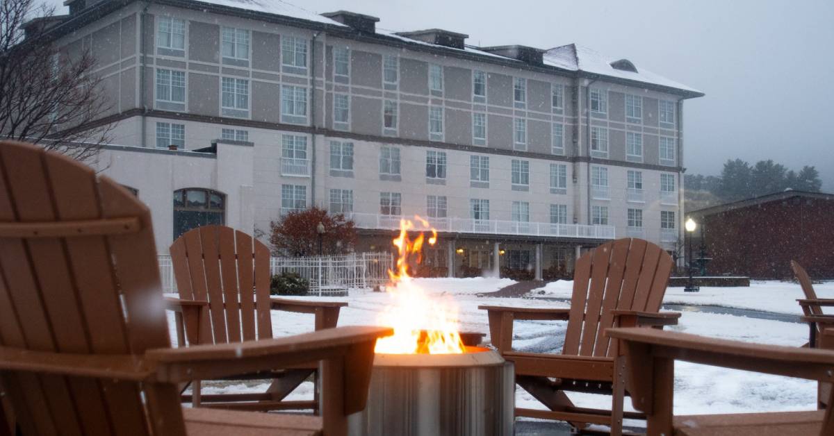 fire pit in winter outside fort william henry hotel