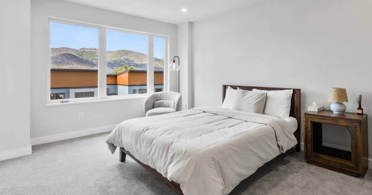 bedroom with view of mountains