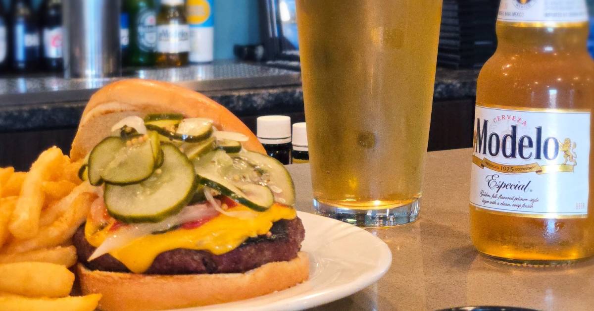 burger with lots of pickles and beer