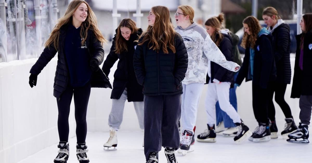 teens on an ice skating rink