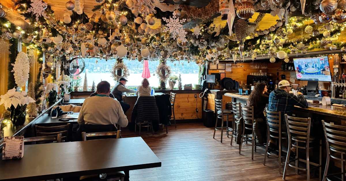 people seated inside a festive decorated restaurant