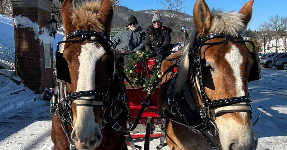 horse drawn carriage ride in lake george in winter