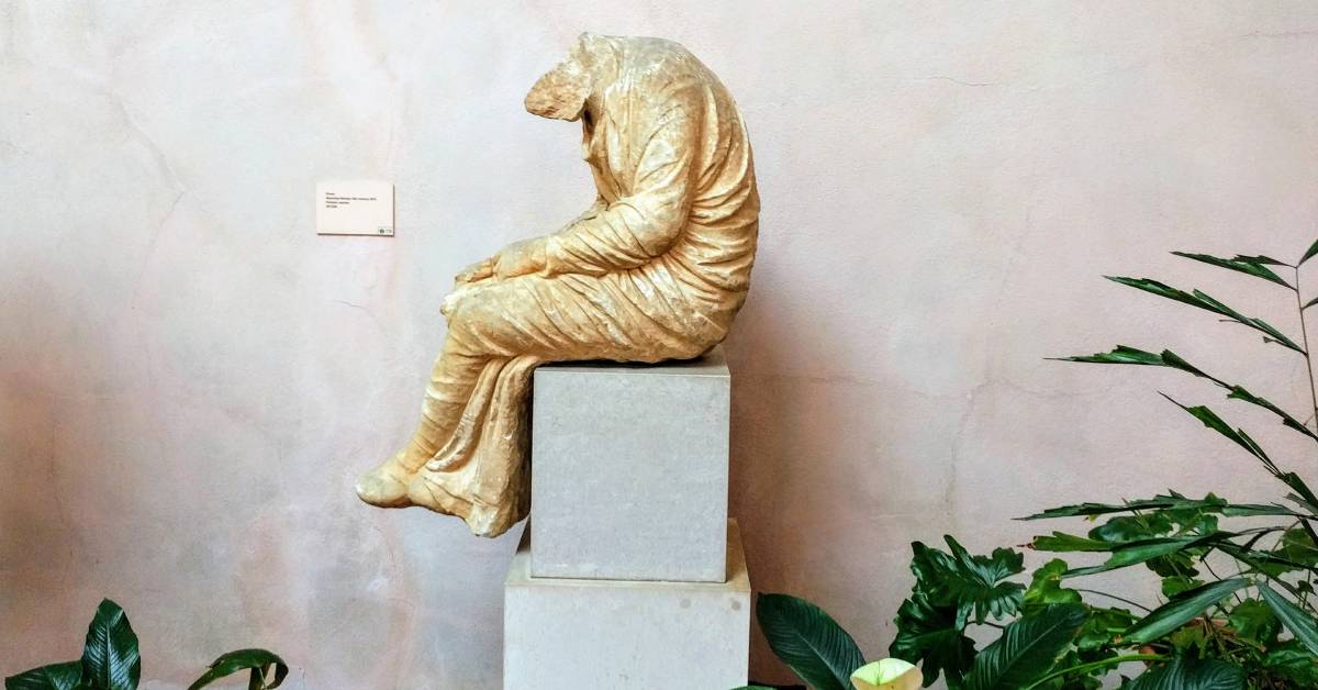 hyde collection statue with man thinking with no head