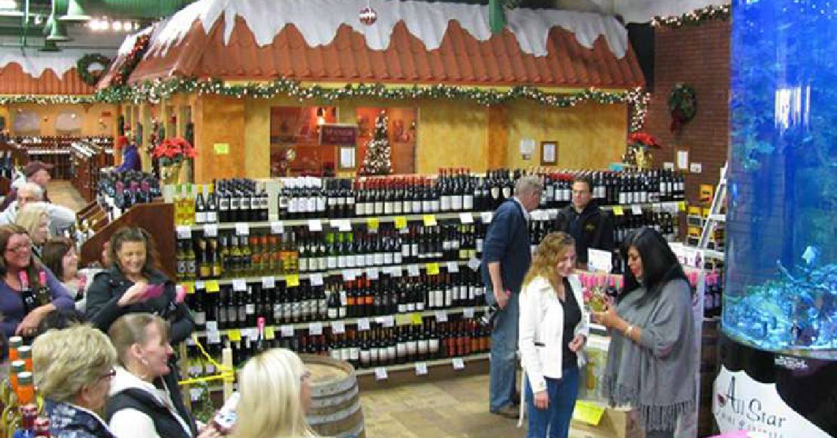 people in line at wine store holiday shopping