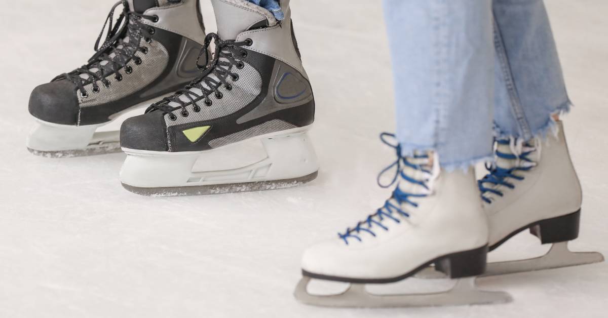 closeup of two people on ice skates
