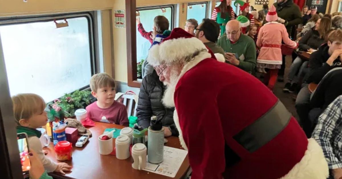 Santa meeting with kids on a train