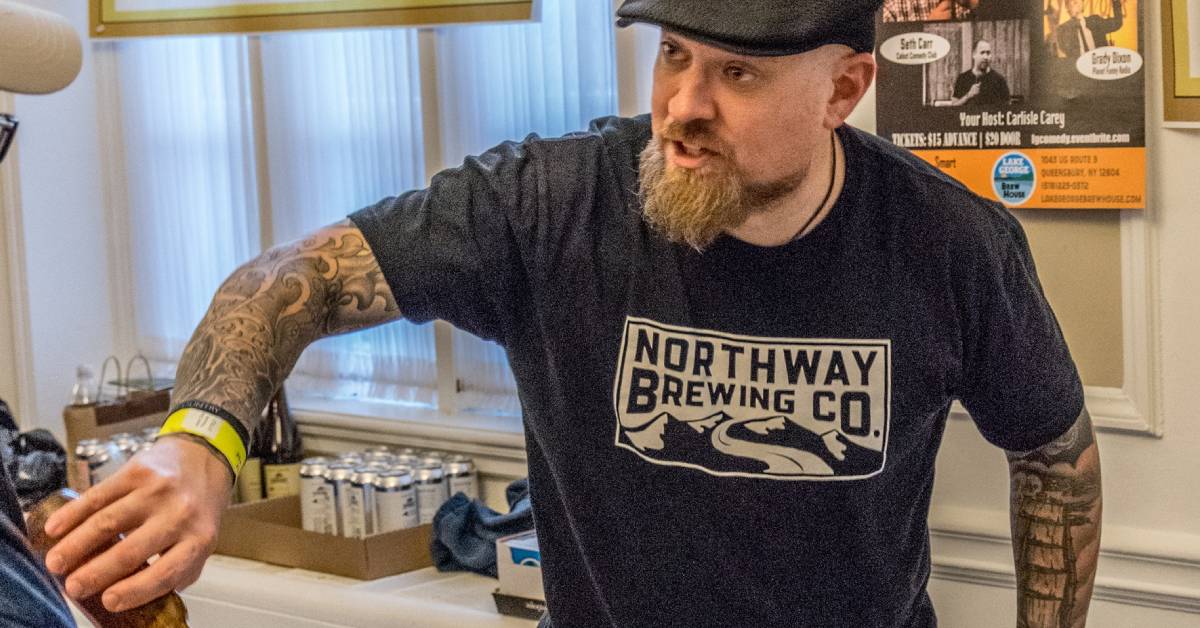 man pouring beer at beerfest