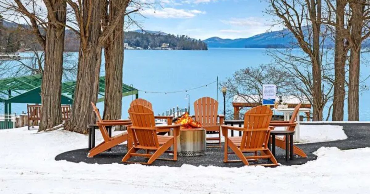 view of fire pit and chairs in winter