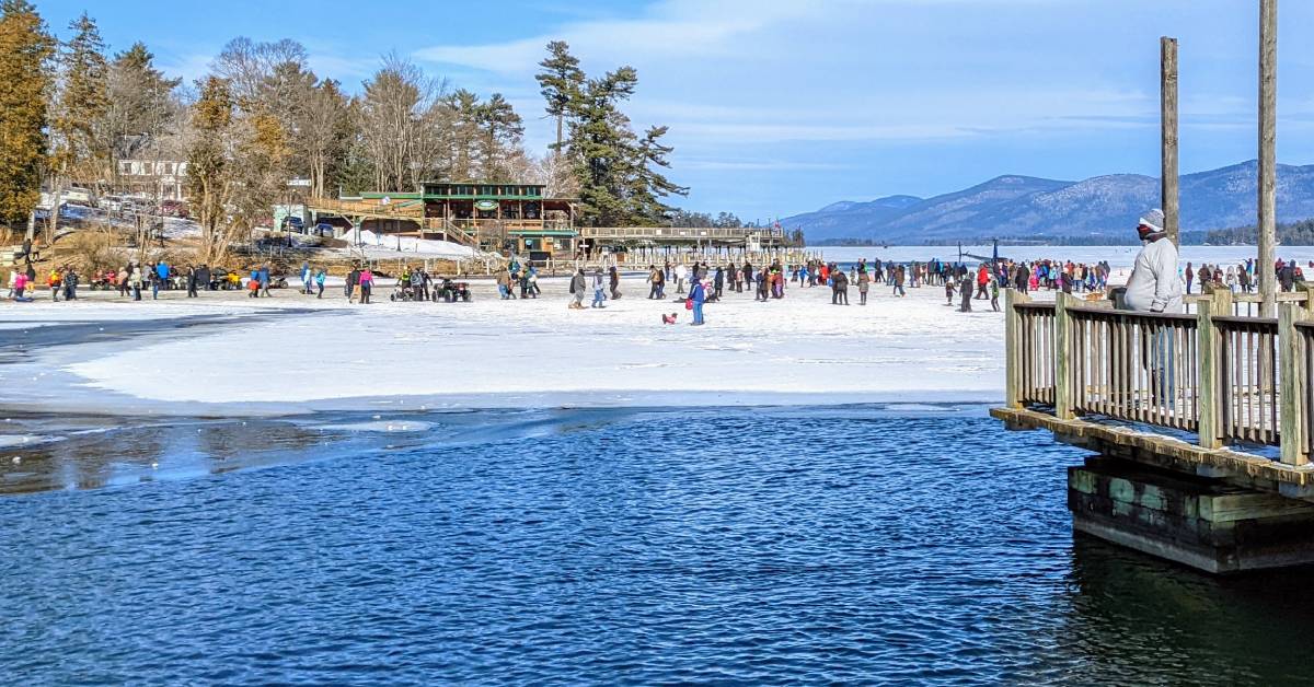 people on ice on lake george at winter carnival