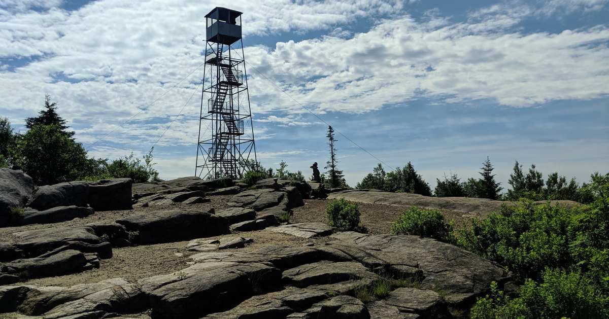 fire tower on a rocky summit