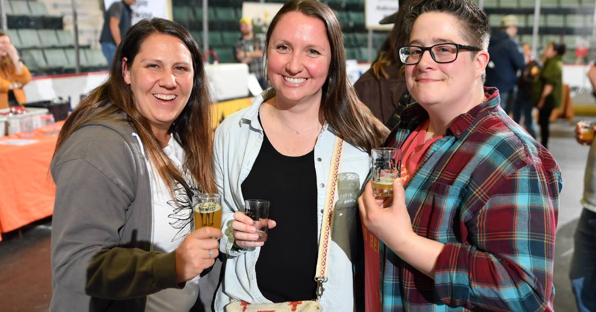 three people pose at glens falls brewfest