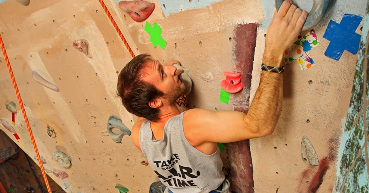 a man rock climbing