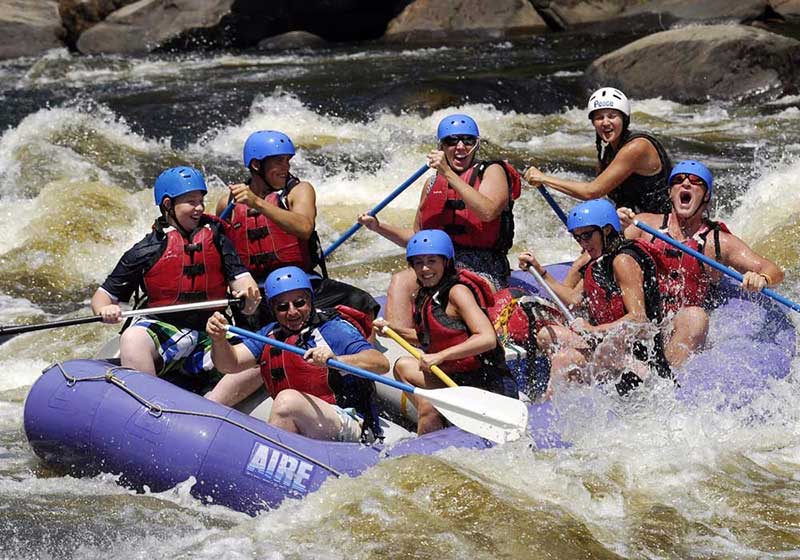 Whitewater rafters navigating rapids on the Hudson River near North Creek NY