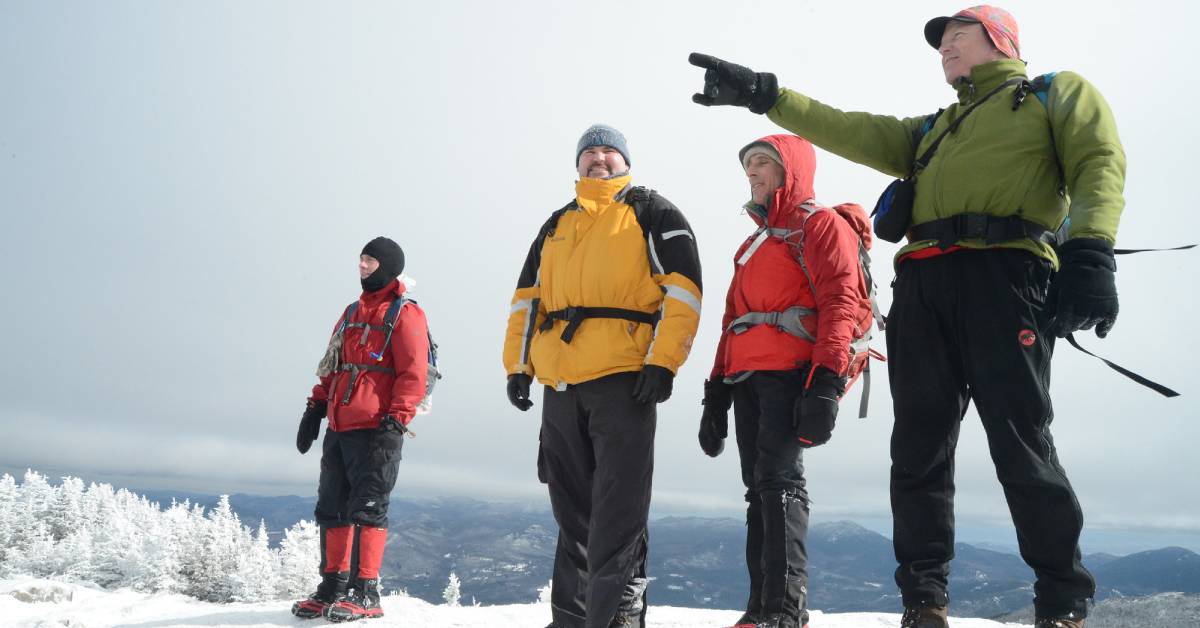 four winter hikers