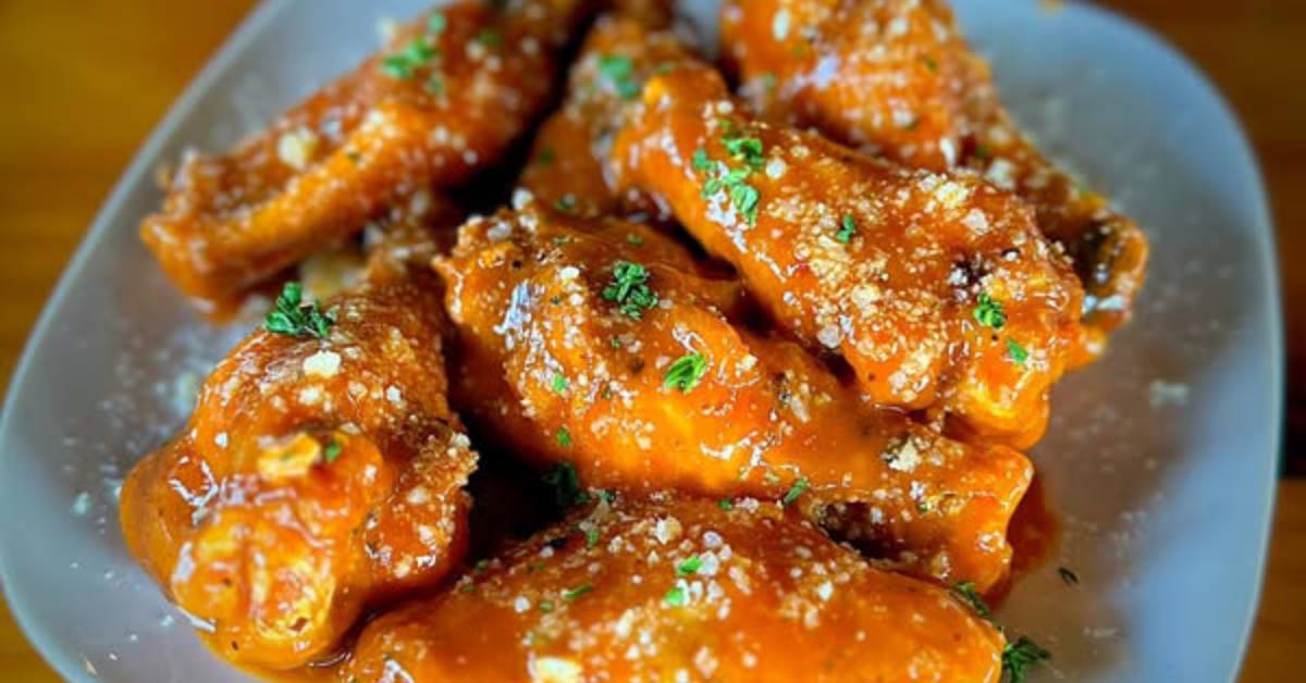 chicken wings covered in sauce