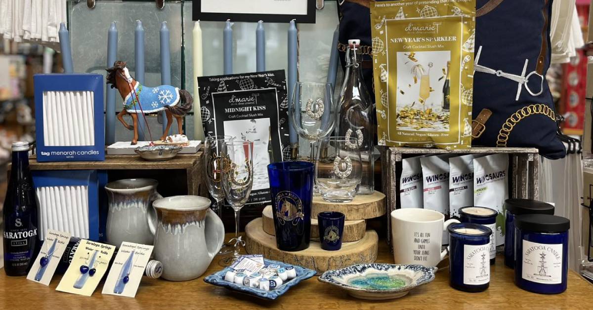 An image of merchandise including candles, dishes, glassware, and more