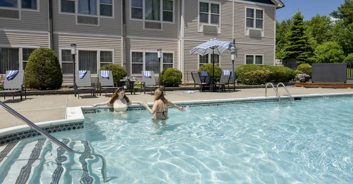 two women in pool at boutique hotel in saratoga springs