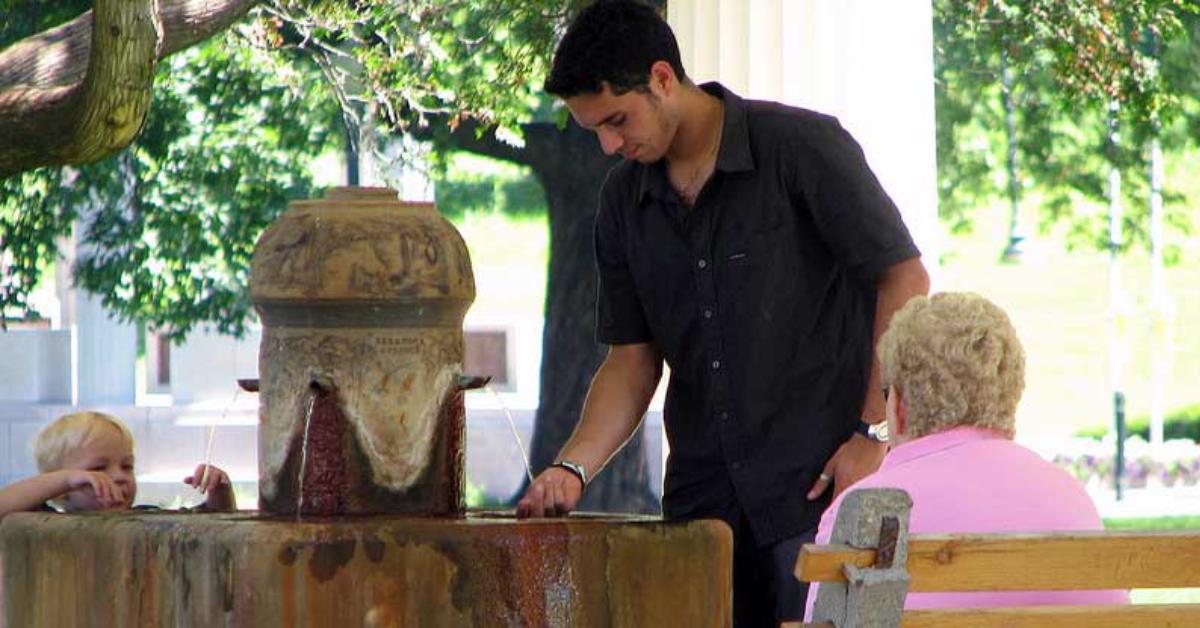 family at a mineral spring