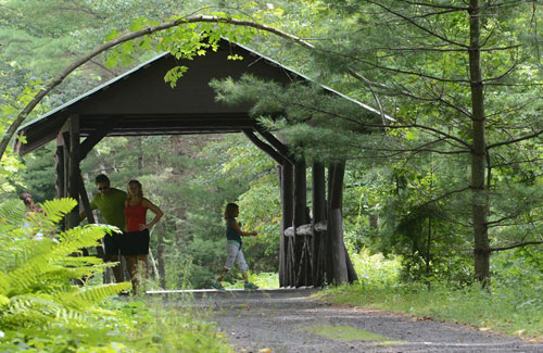 people under a covered bridge