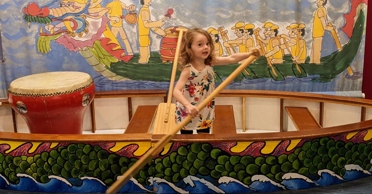 little girl at world awareness children's museum