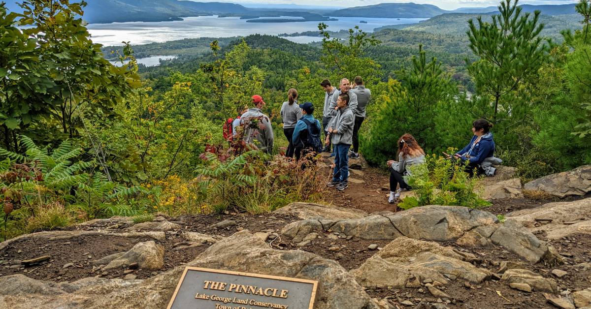 hikers at pinnacle summit in bolton landing