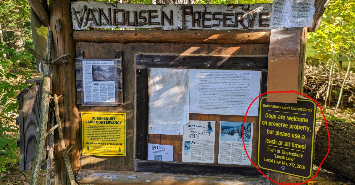 van dusen preserve trailhead with sign circled saying dogs are welcome but use a leash