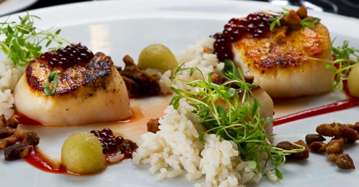 cooked scallops, rice, and sides