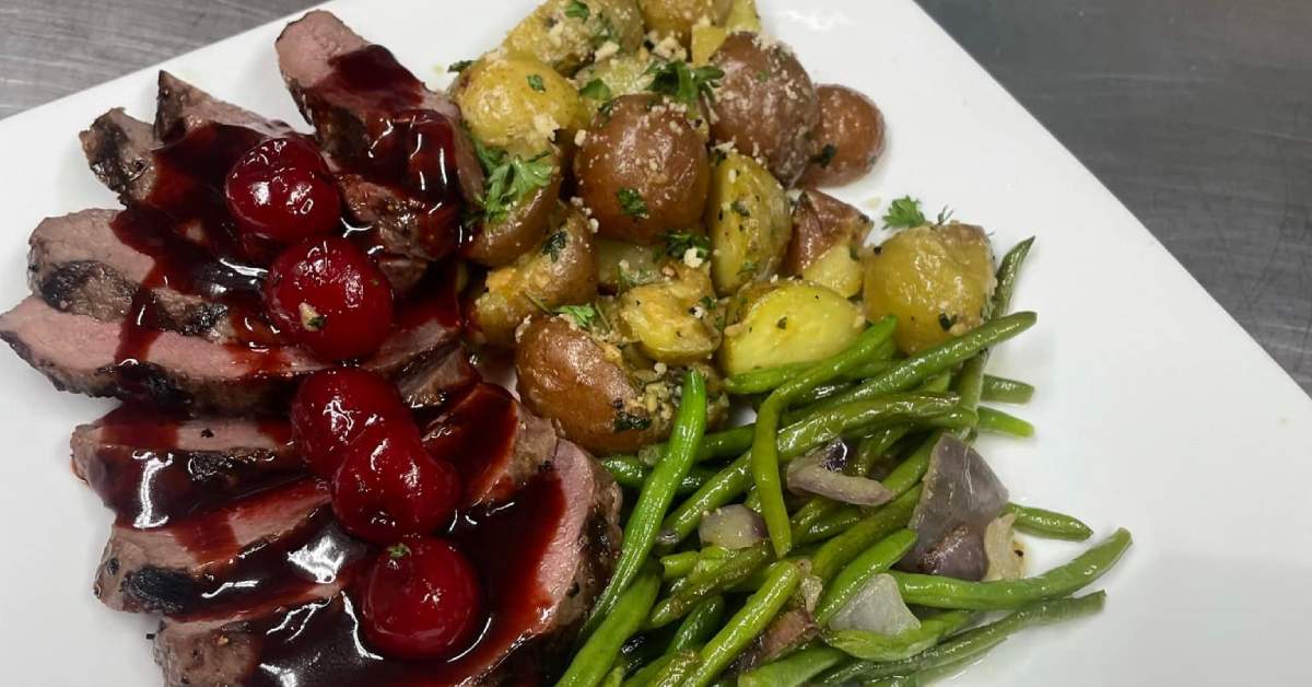 pork, berries, potatoes, and green beans