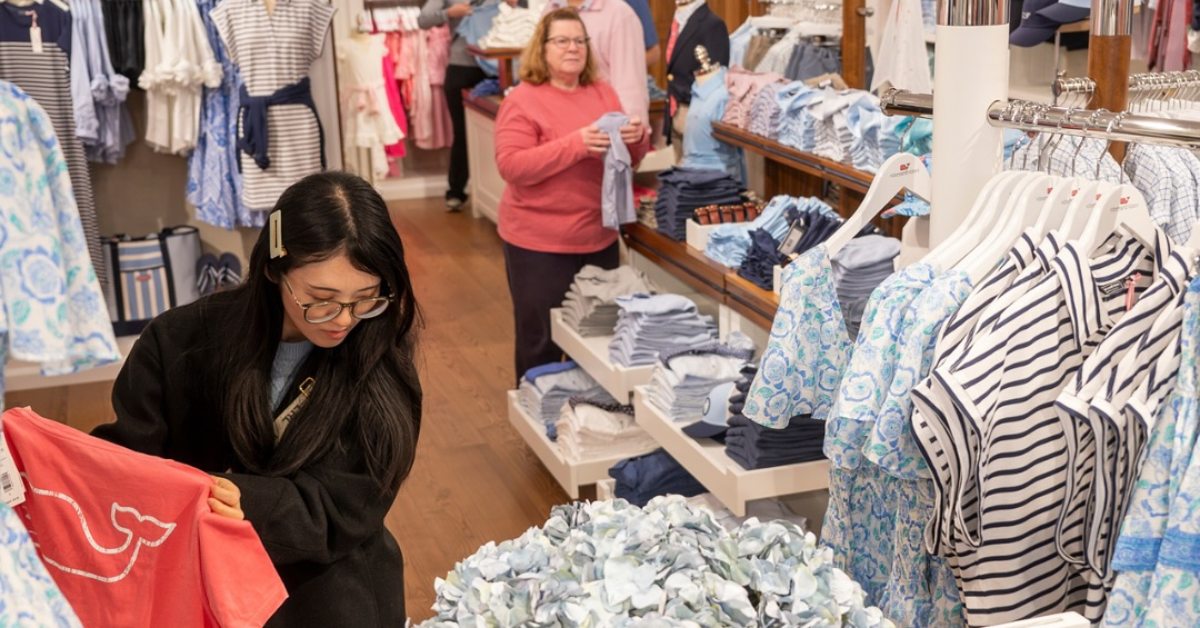 two women shopping in clothes store