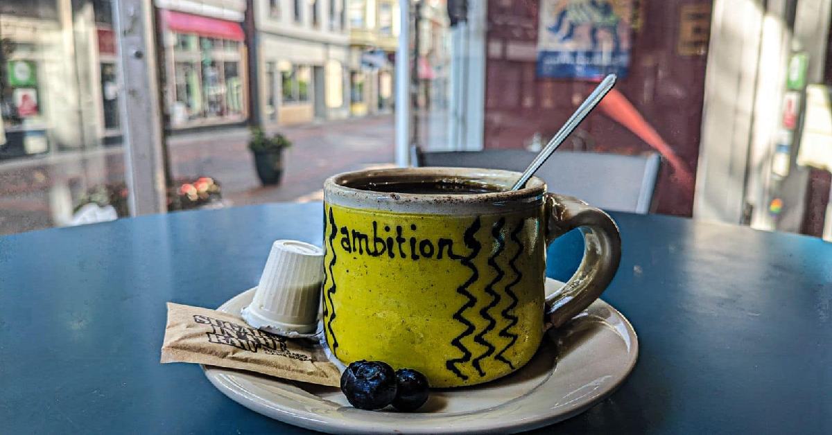 hot cup of blueberry coffee