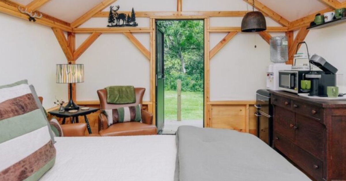 bed and appliances inside a glamping tent cabin