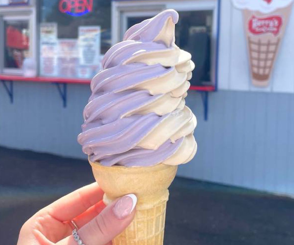 purple and white ice cream twist on a cone