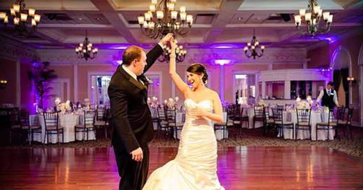 A couple dances their first dance