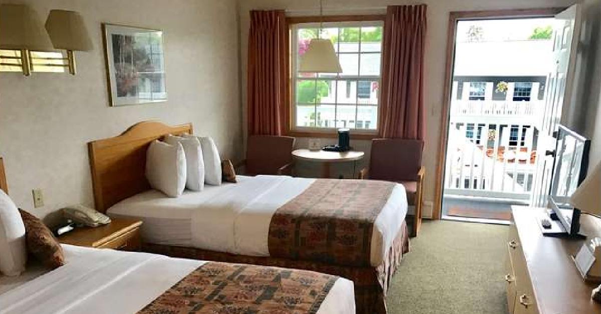 two beds and a window
