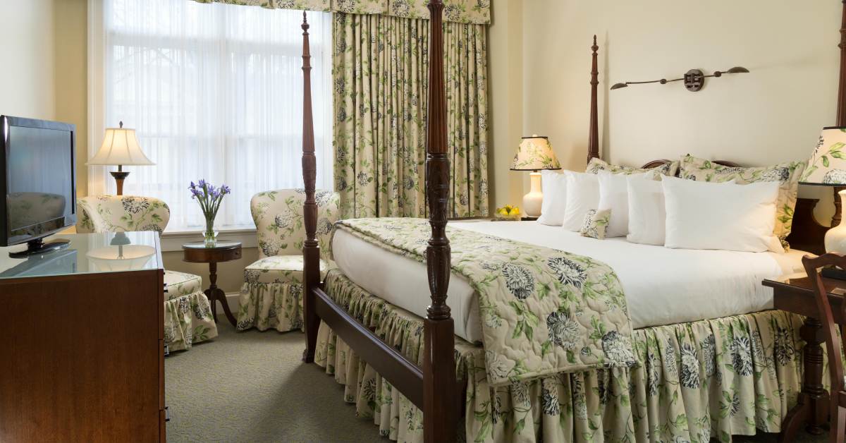 B&B room with a quilted blanket and tv on the dresser