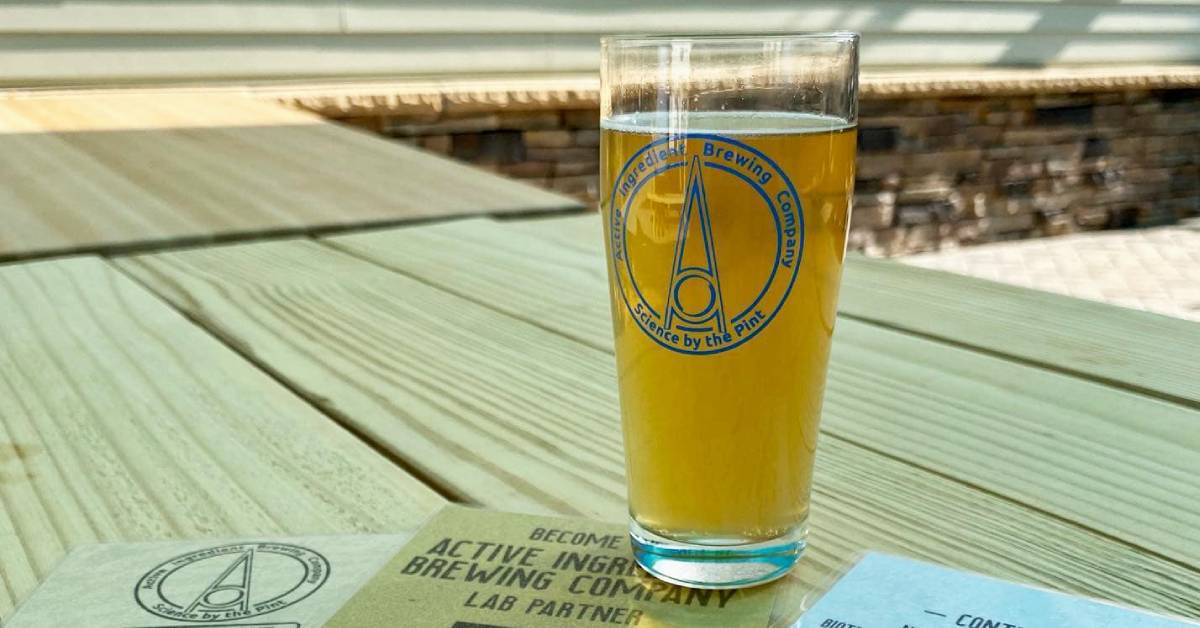 glass of beer from Active Ingredient Brewing Company on a patio table